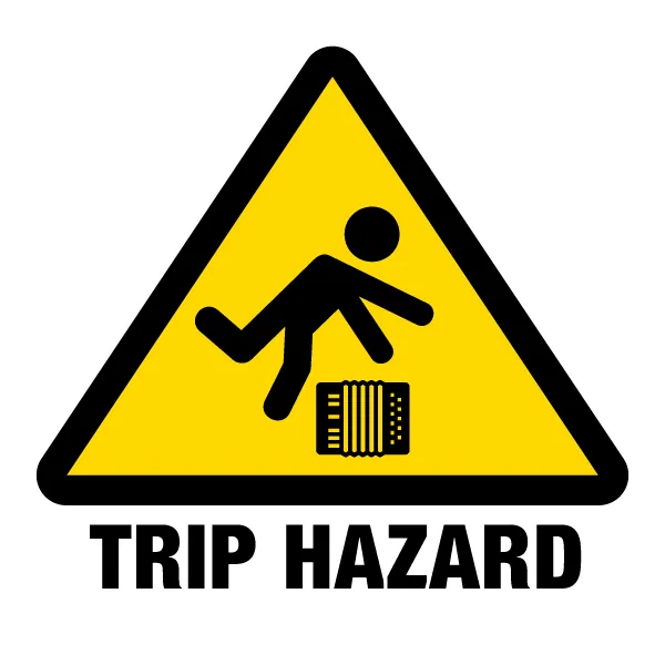 "Trip Hazard": A warning triangle depicting a person falling over an accordion